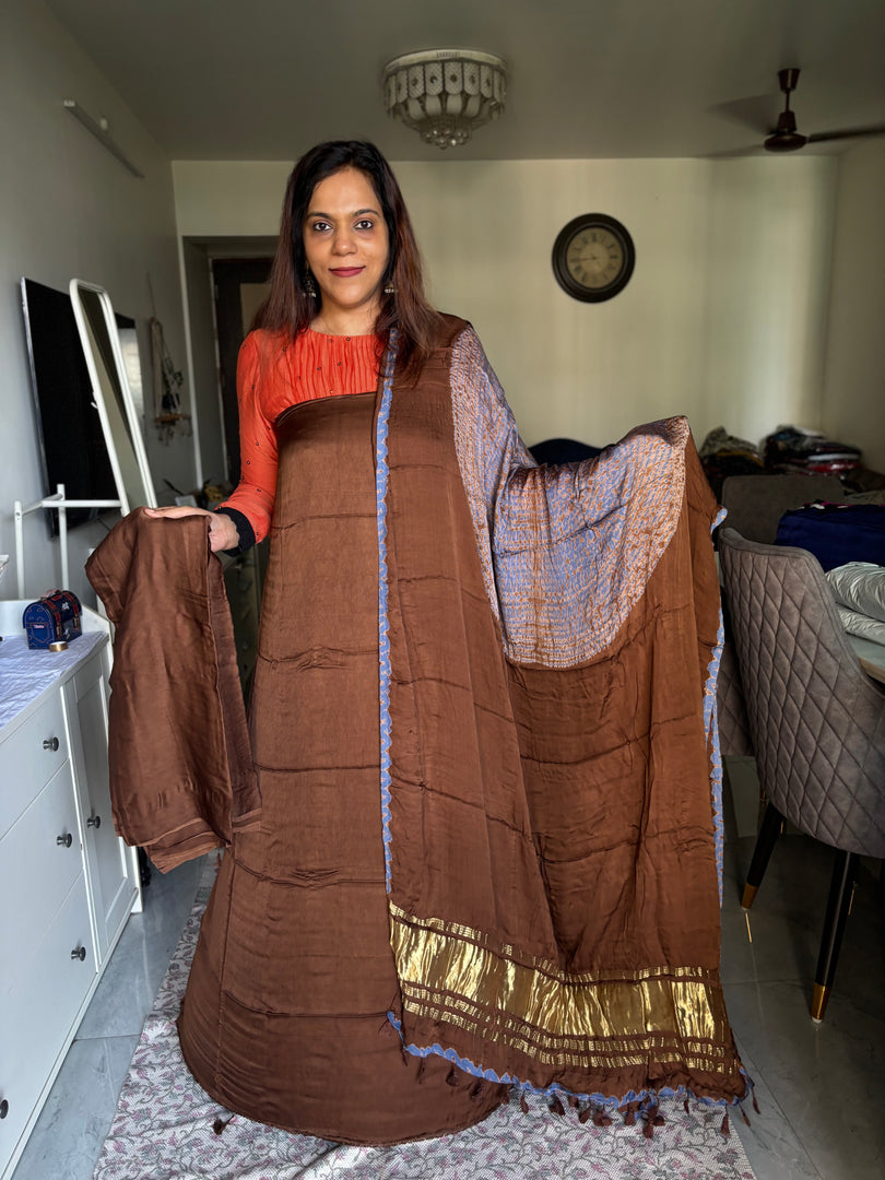 Plain modal silk top and bottom with modal silk shibori dupatta with tissue pallu and tazzels 3 piece set