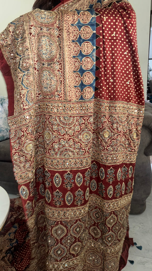 Handworked natural dye modal silk ajrakh saree with tazzels and blouse piece
