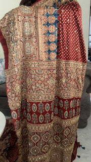 Handworked natural dye modal silk ajrakh saree with tazzels and blouse piece