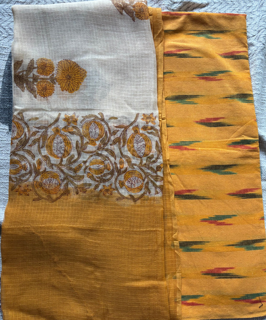 Pure Ikkat cotton top paired with handblocked Kota doria dupatta 2 piece set