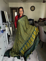 Load image into Gallery viewer, Natural dyed handblock ajrakh modal silk saree with tazzels

