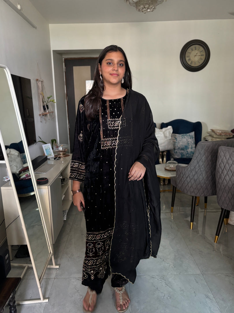 Premium Handblocked Ajrakh Velvet Silk Handworked Top, paired with a matching Velvet Silk Bottom and an elegant Organza Dupatta detailed with Cutdana Scalloping 3 piece set stitched