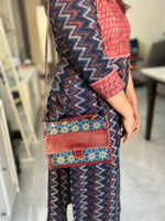 Load image into Gallery viewer, PURE LEATHER BAG WITH MASHRU SILK AJRAKH FABRIC
