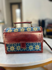 PURE LEATHER BAG WITH MASHRU SILK AJRAKH FABRIC